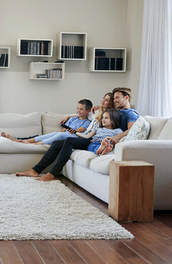 Family Enjoying Gas Heating